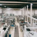 Shooting fotografico industriale professionale con focus su processi e strutture